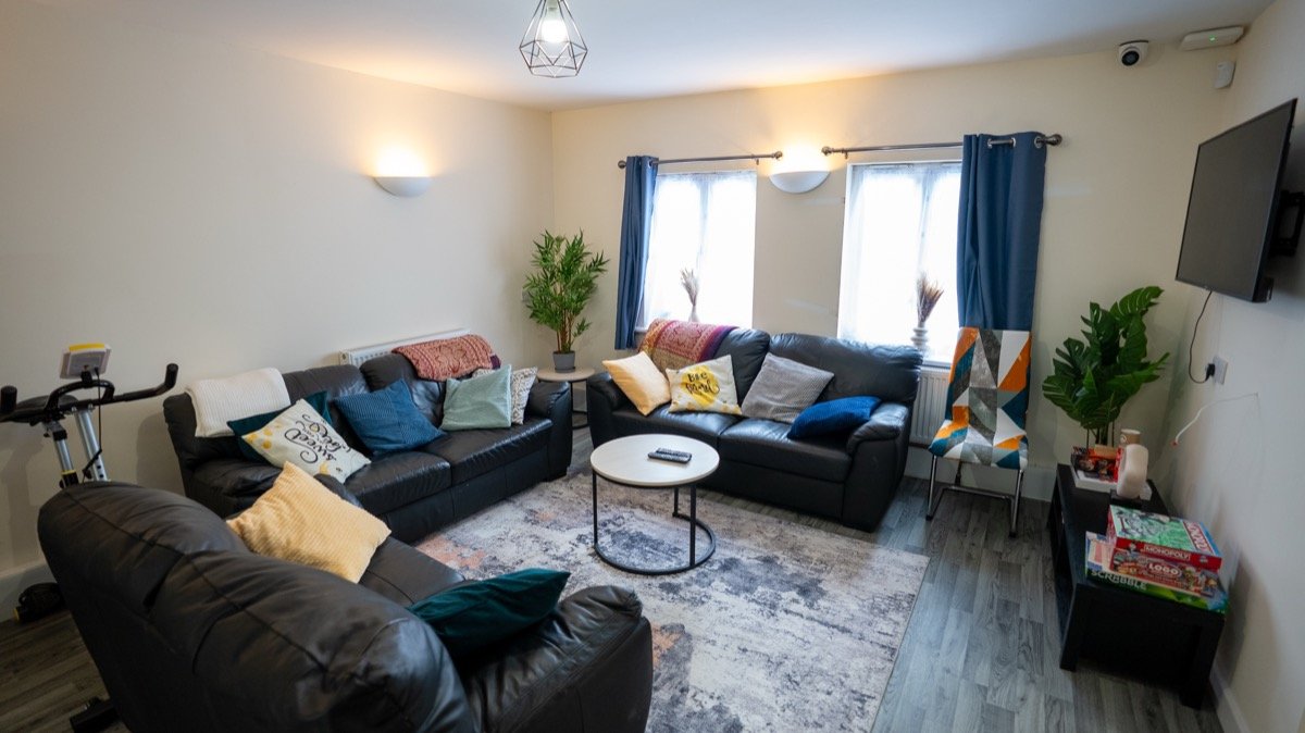 Living room with comfortable furnishings at The Forge